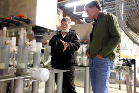 Project Leader Ken Gillette shows Dan around