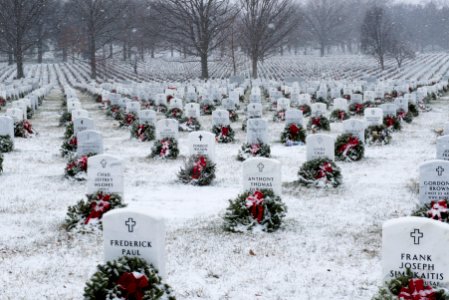 Snow falls in Arlington National Cemetery photo