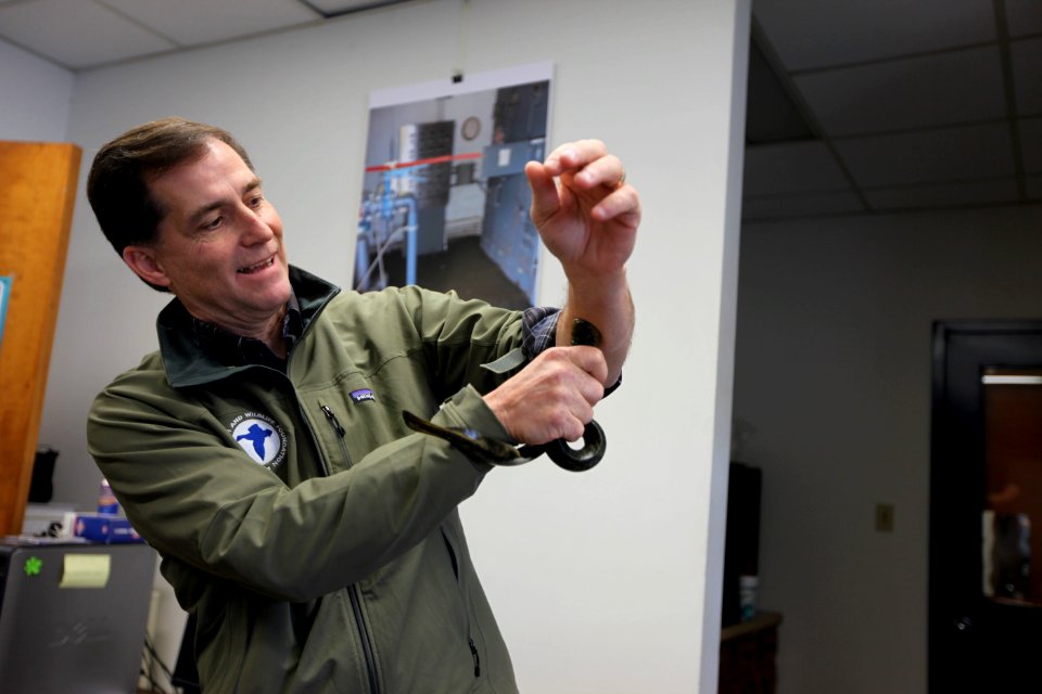 Service Director Dan Ashe with a lamprey attached to his arm!
