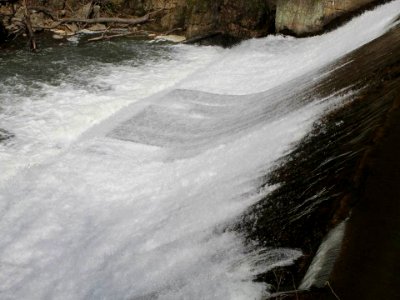 Water flowing over the Hughesville Dam