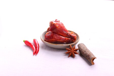 Food shoot chicken legs red pepper photo