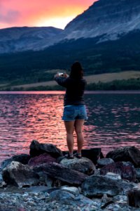 Visitor Taking Photo of the Sunset photo