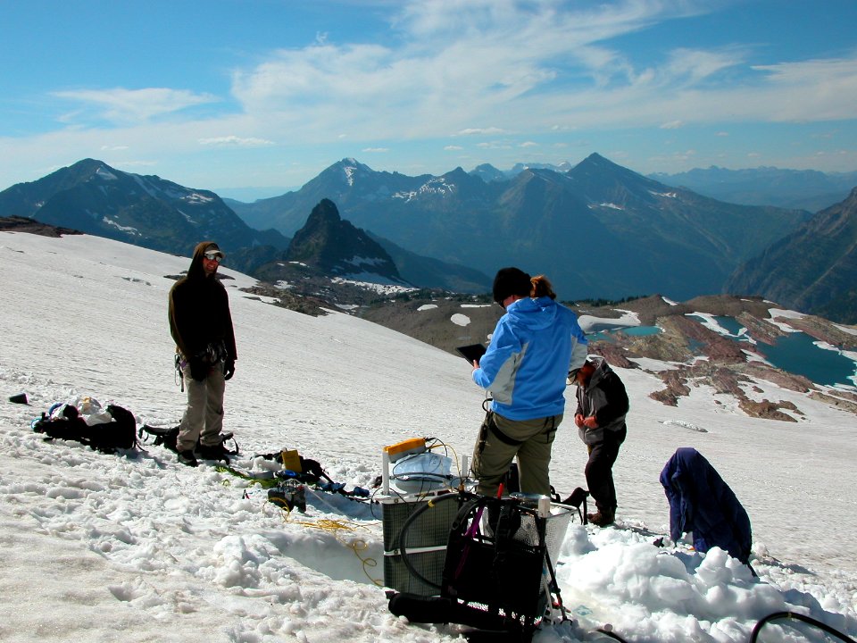 Scientists recording data on Sperry Glacier