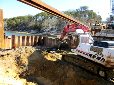Working in the “dry,” behind the sheetpile, construction of new tidal channel