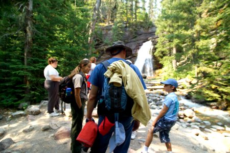 Visitors with a ranger at Baring Falls