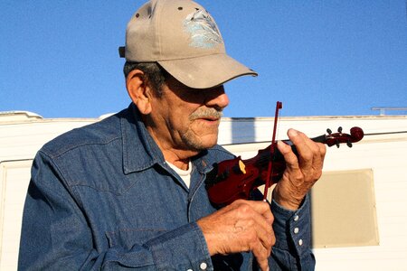 Old man violin musician
