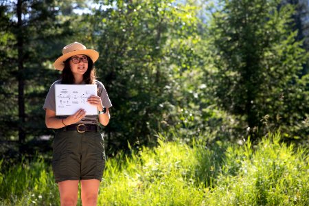 Park Ranger looking for Critters in the Creek