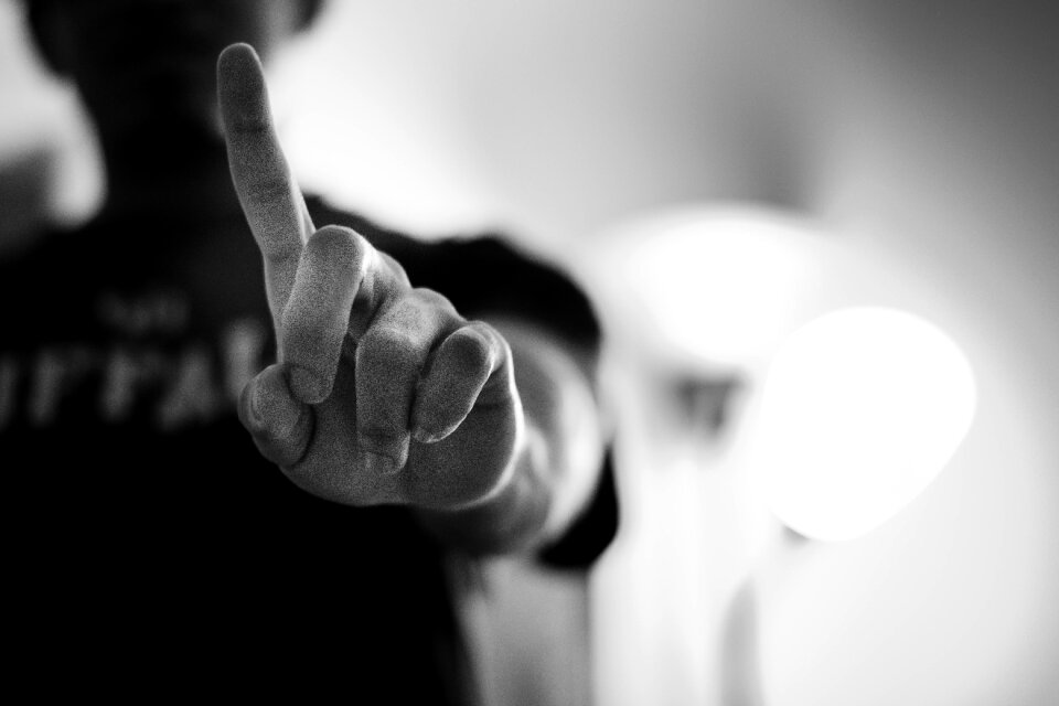 Pointing hand black and white