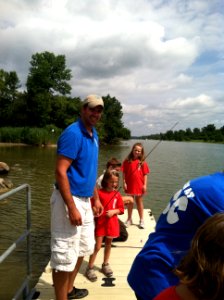 Career Discovery Intern, Tyler Barriere, helps kids fish at Montezuma NWR