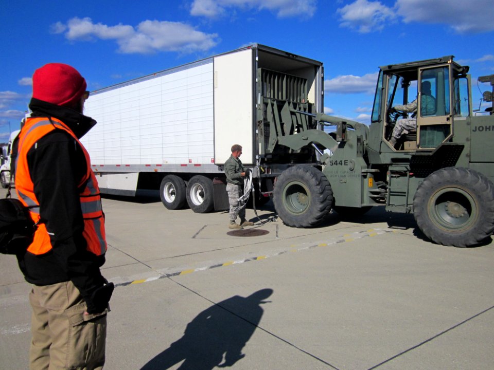 Unloading relief supplies (WV)