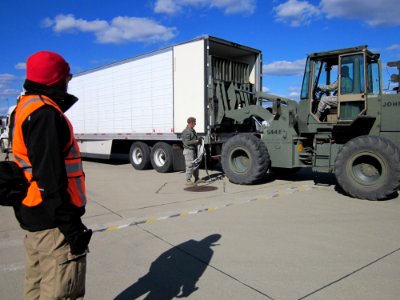 Unloading relief supplies (WV)