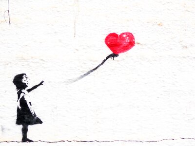 Child playing heart girl
