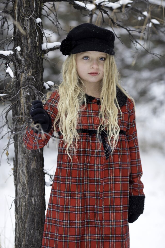 Snowfall pretty girl winter background