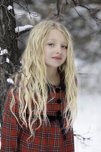 Snowfall portrait young photo