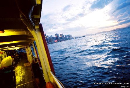 Capturing Sunset while crossing the Victoria Harbour photo