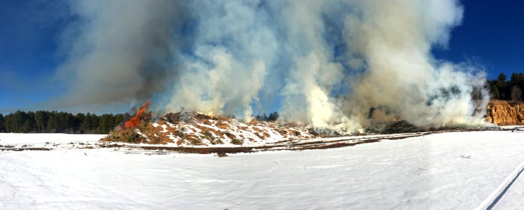 Green waste pile burning at Willard Springs Transfer Station