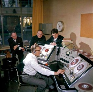 Engineer in the AVRO Radiostudio in the Netherlands with 3x Philips EL 3500 recorders. photo