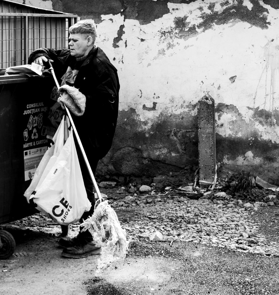 Elderly Woman with a mop