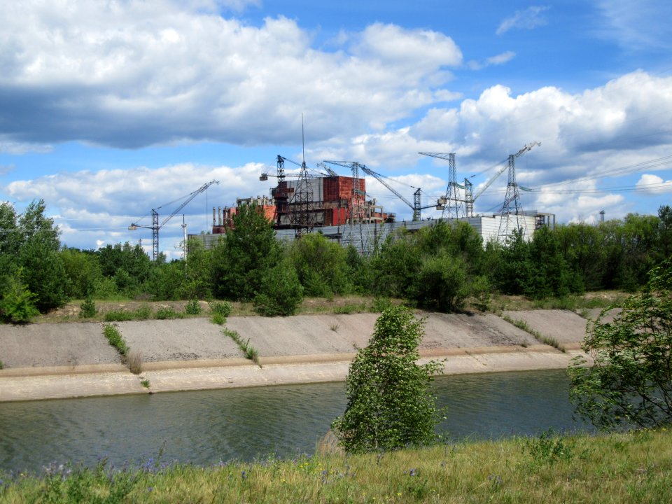 Reactor 4 cooling canal and the unfinished still under construction at the time of the accident reactors 5 and 6 Chernobyl exclusion zone Ukraine