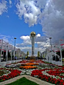Flowers Clouds and Bayterek Tower Astana Kazakhstan