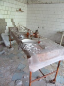 Bottles and medical stuff Pripyat Hospital Chernobyl exclusion zone Ukraine photo