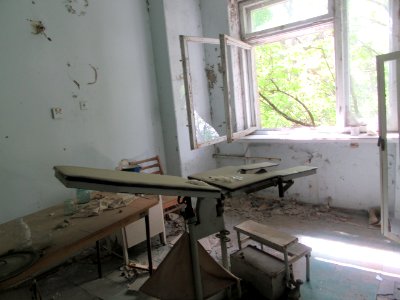 Examination table Pripyat hospital Gynocology department Chernobyl exclusion zone Ukraine