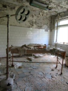 Examination room in the hospital Pripyat Chernobyl exclusion zone Ukraine photo