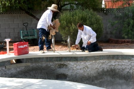 Cutting Down the Old Pool Rails