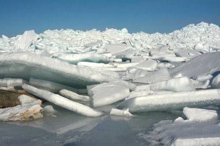 Blue ice along the Straits of Mackinac photo