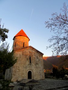 Front of Kis Albanian Church Azerbaijan 5th century with a Russian Mig in the background