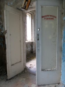 Door to gynocology department Pripyat hospital Chernobyl exclusion zone Ukraine