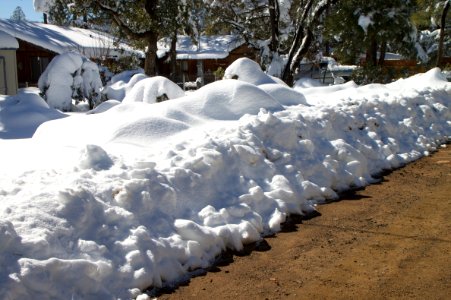 Snow Plows Add Snow Piles