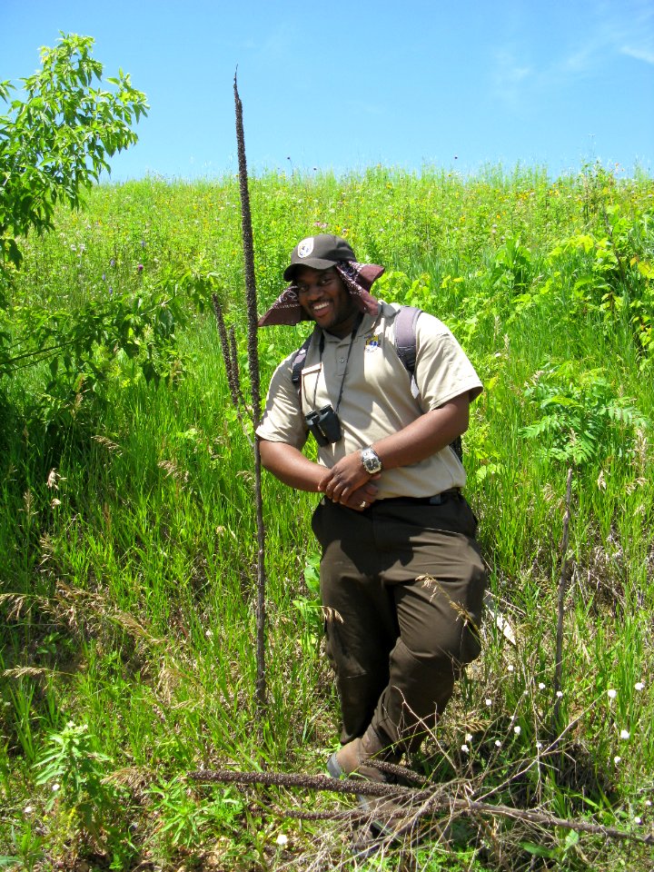 Lionel Grant next to the life sized Mullen at the 2010 Biology Camp