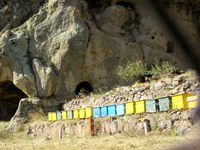 Beehive and monk cells in the cave Geghard Monastery Armenia
