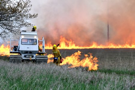 Crews perform a controlled burn at Schlee Waterfowl Production Area photo