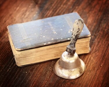 Prayer book antique bell photo