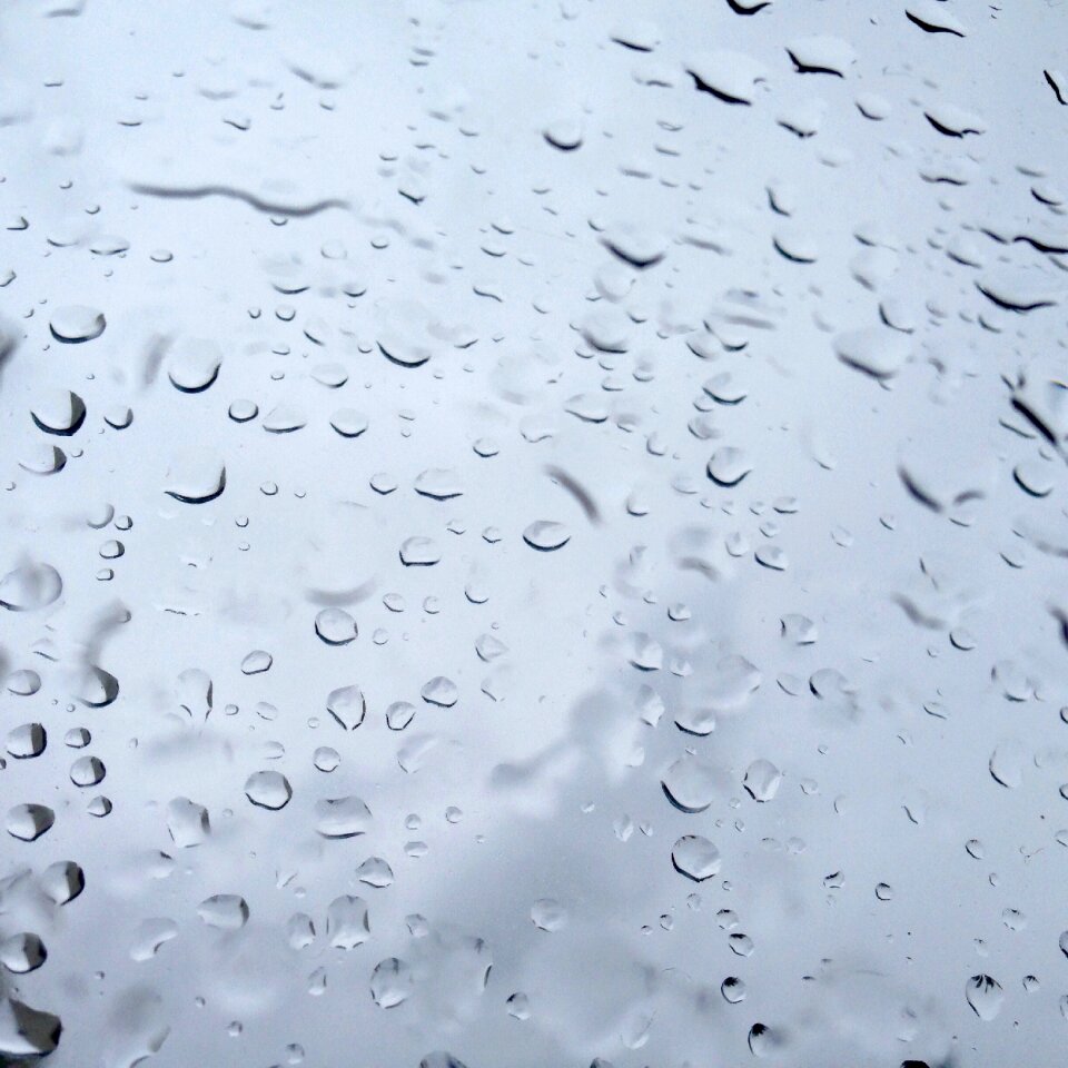 Water drops the window rainy day photo