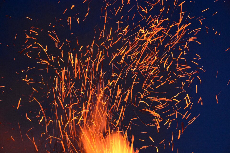 Embers burn wood fire