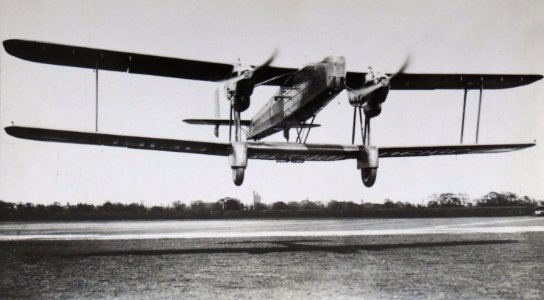 Handley Page Heyford at HP Radlett airfield circa 1930`s with Napsbury Hospital tower on centre horizon