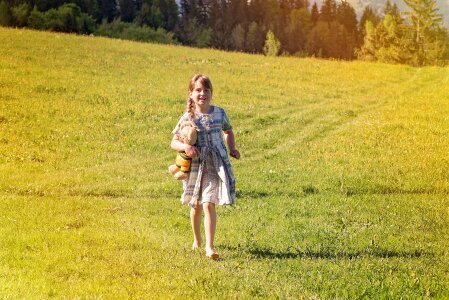 Blond barefoot teddy bear photo