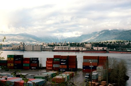 Industrial Area with Mountains + Ocean, Vancouver photo