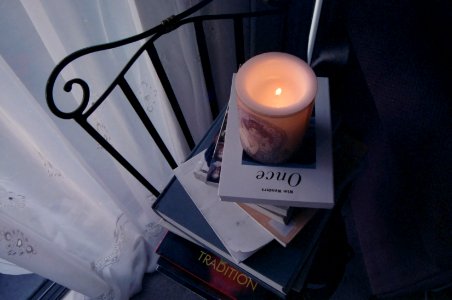 candle with books