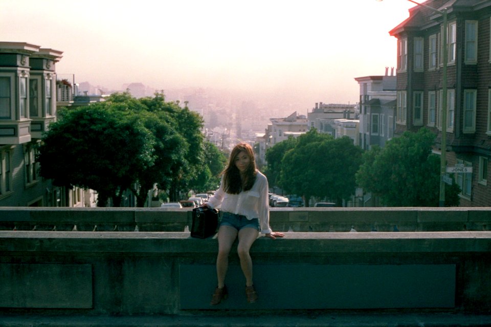 Girl sitting on ledge, Russian Hill