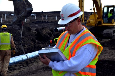 USACE quality assurance representative monitors construction