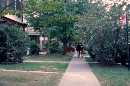 Couple walking on sidewalk
