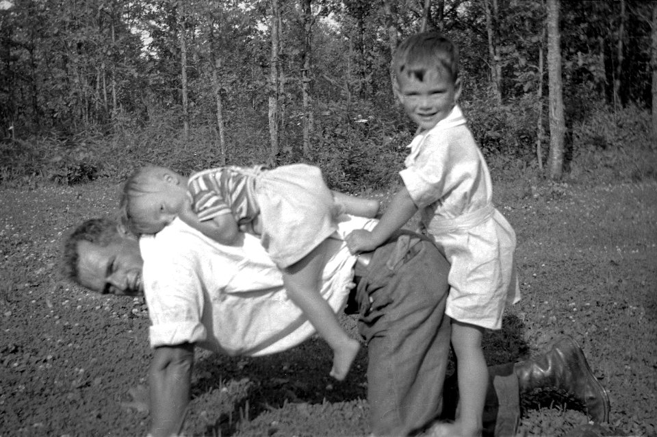 Dad, David, Martin play on lawn
