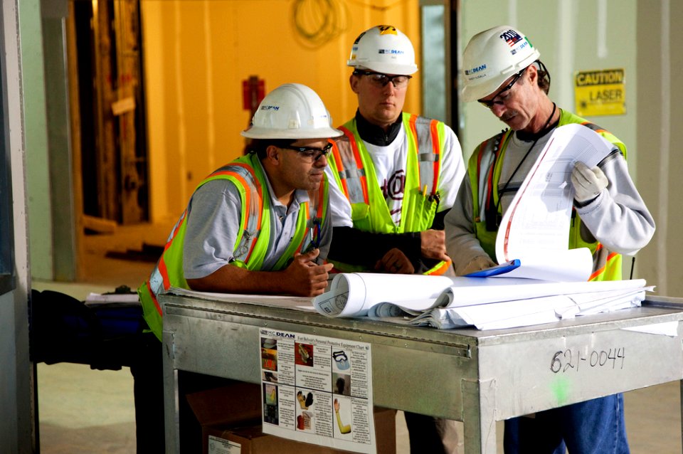 Contractors review plans