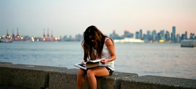 sitting on the seawall photo