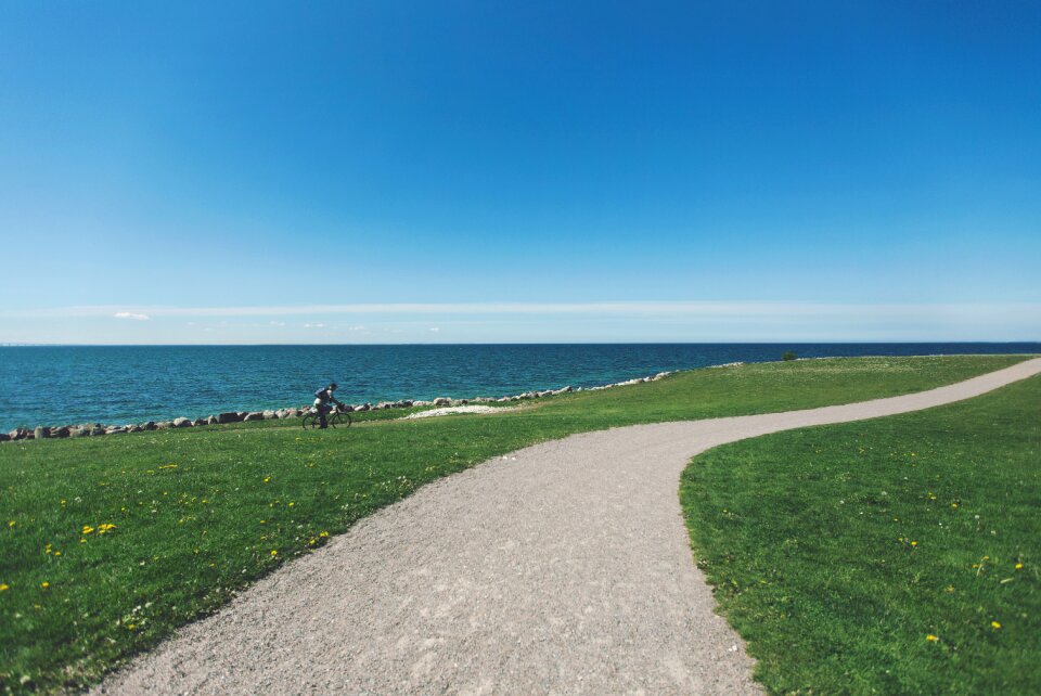 Grass cyclist cycling photo