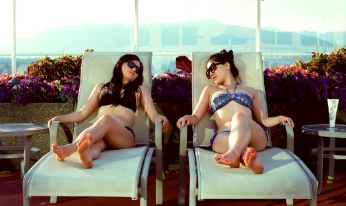Friends Relaxing by the Pool